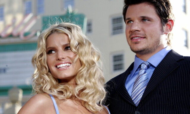 Actress Jessica Simpson (L) and her husband Nick Lachey arrive at the Los Angeles premiere of Warner Brothers pictures "The Dukes of Hazzard" at the Grauman's Chinese theatre in Hollywood in this July 28, 2005 file photo. Simpson filed for divorce on December 16, 2005 from her husband Lachey citing irreconcilable differences. REUTERS/Mario Anzuoni/File